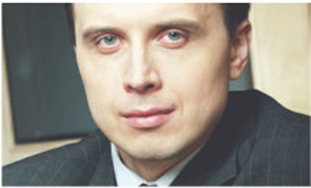 Michał Grzybowski, doradca podatkowy, dyrektor w Ernst & Young