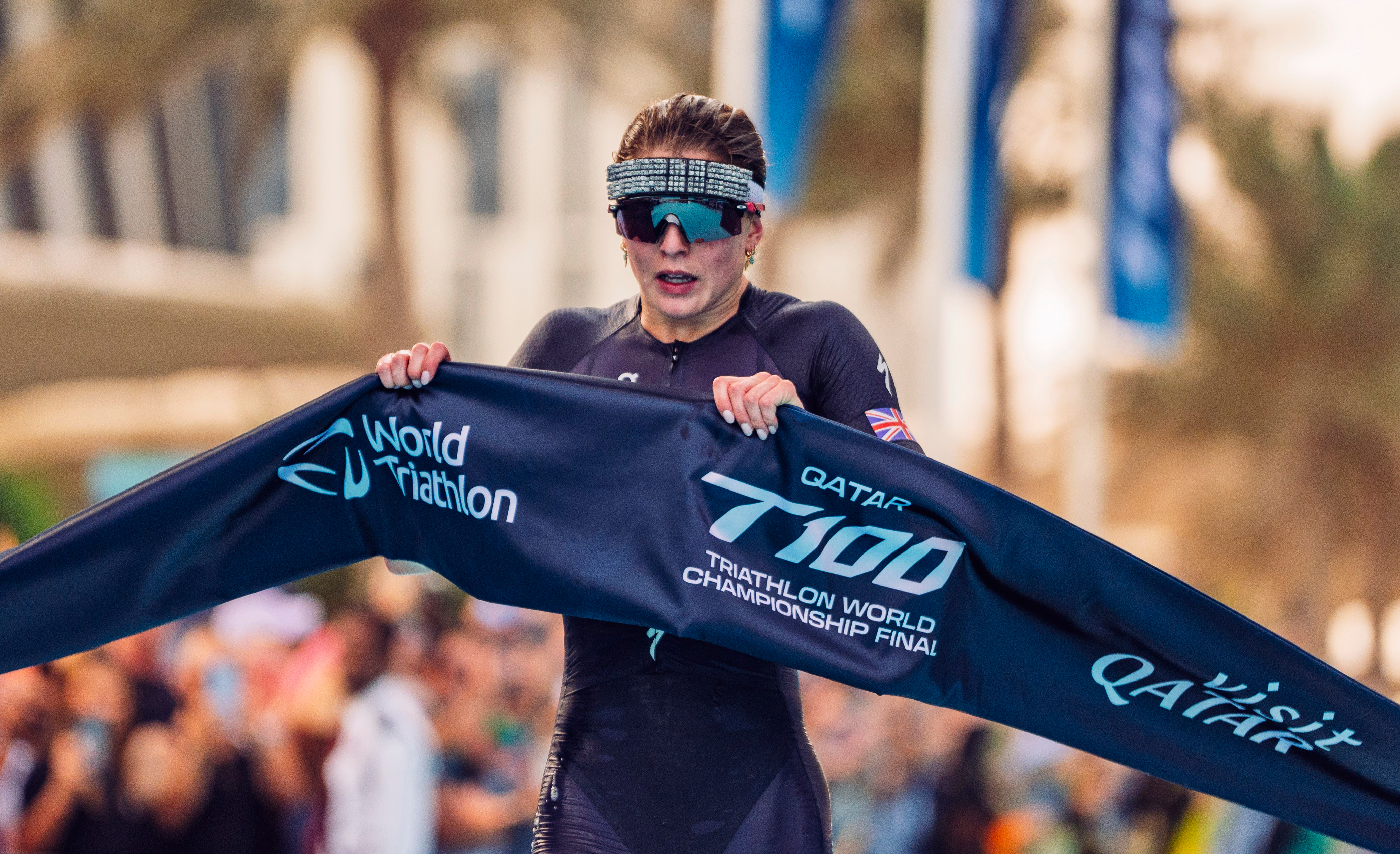 British triathlete collapses across finish line to win $200k world title