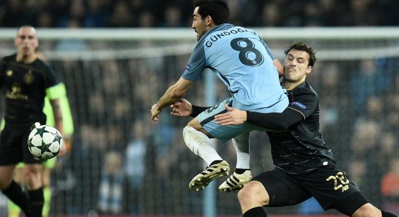 Celtic's Danish defender Erik Sviatchenko (R) has been the rock of Celtic's defence this season