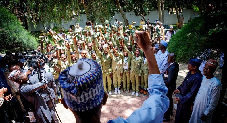 President Muhammadu Buhari with corps members in Daura, Katsina State