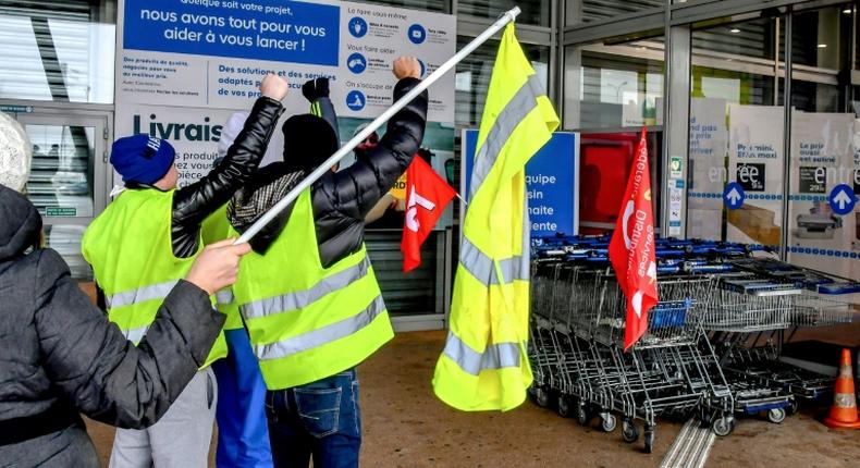 About 30 yellow vest protestors joined striking employees at a hardware store in Englos, northern France, on Friday who were seeking higher pay