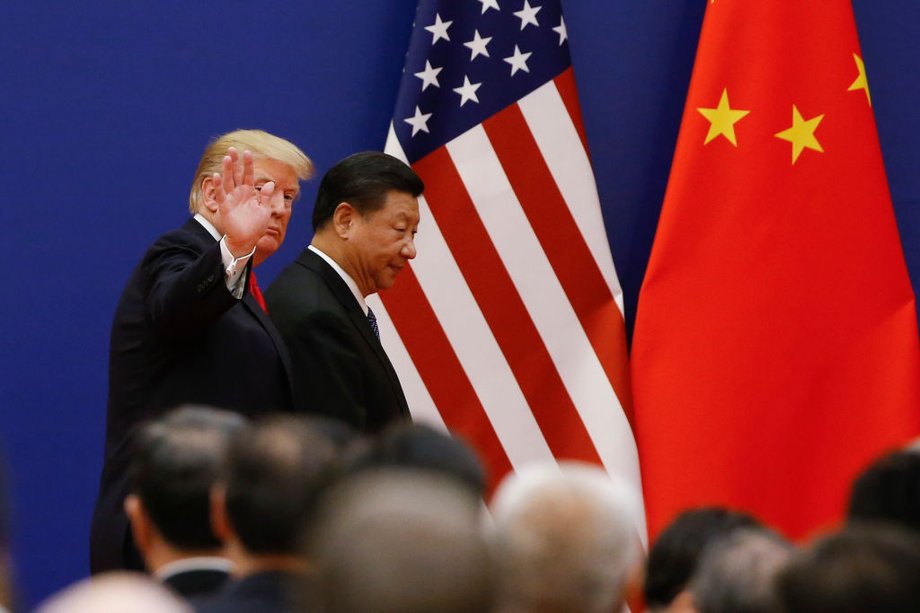 Trump and Xi with business leaders at the Great Hall of the People on Thursday in Beijing.