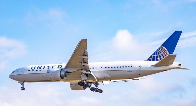 A United Airlines Boeing 777-200 aircraft landing at London Heathrow International Airport in August 2019.