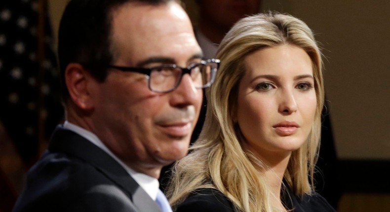 Ivanka Trump, daughter and advisor to President Donald Trump, and Treasury secretary Steven Mnuchin listen at an event in Derry, N.H., on April 17, 2018.
