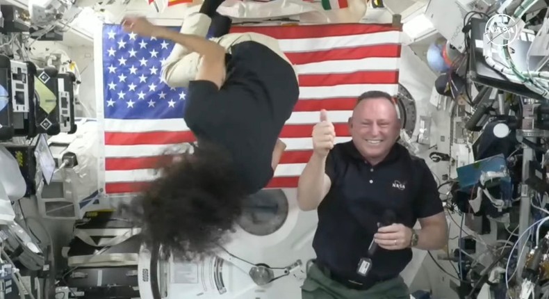 Williams did a flip in the space station's microgravity and Wilmore gave a thumbs up as the press call ended.NASA TV