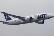 Boeing 787 Dreamliner purchased by Poland's LOT Airlines performs a low altitude flyover at the Chopin International Airport in Warsaw