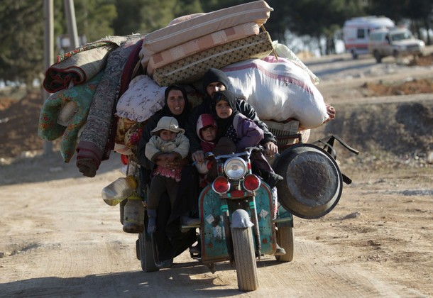 People who fled the violence from Islamic State-controlled northern Syrian town of al-Bab arrive in 