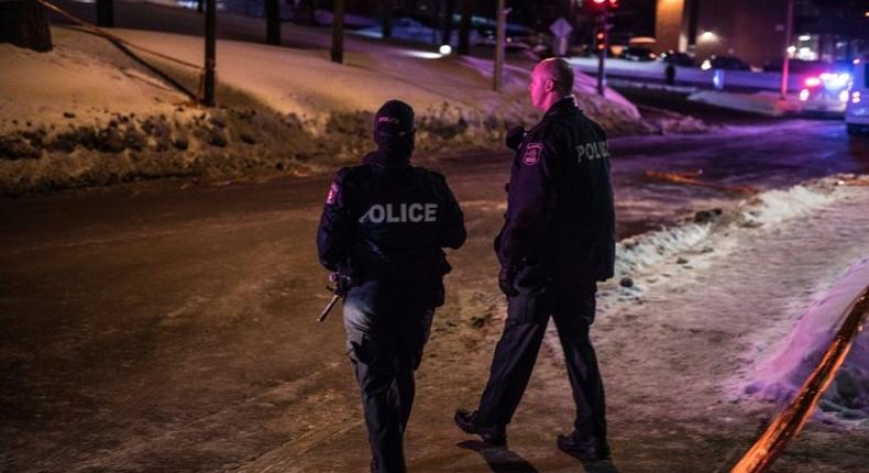 Canadian police officers patrol after a shooting in a mosque at the Quebec City Islamic cultural center on January 29, 2017