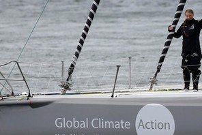 Swedish teenage climate activist Greta Thunberg waves from a yacht as she starts her trans-Atlantic boat trip to New York, in Plymouth