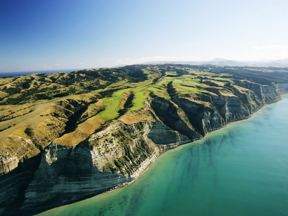 The Cape Kidnappers golf course, designed by legendary golf architect Tom Doak, features narrow fairways perched 460 feet above the Pacific Ocean in Hawke’s Bay, New Zealand. The course is a challenge for golfers of all skill levels, and its breathtaking setting only adds to its appeal.