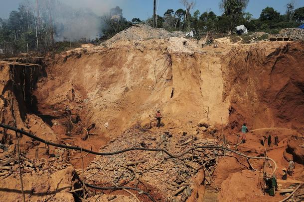The Wider Image: Brazilians toil for gold in illegal Amazon mines