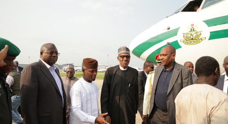 Acting President Yemi Osinbajo welcomes President Muhammadu Buhari