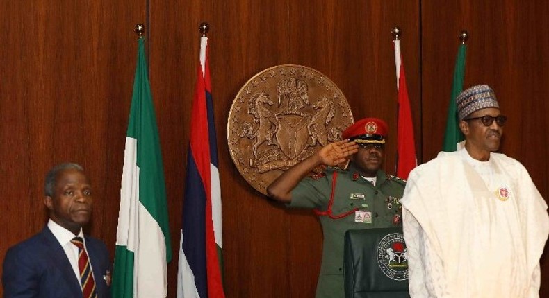 Vice President Yemi Osinbajo (left) and President Muhammadu Buhari (right) during Federal Executive Council (FEC) meeting at the Presidential Villa