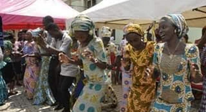 Released Chibok girls reunite with families in Abuja amidst tears