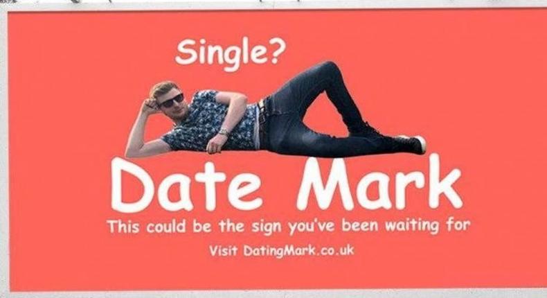 Tired single man resorts to billboard advertisement to find a suitor