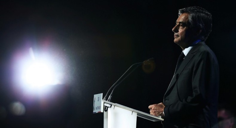 French presidential candidate for the right-wing Les Republicains (LR) party Francois Fillon delivers a speech during a campaign rally in Caen, northwesthern France, on March 16, 2017