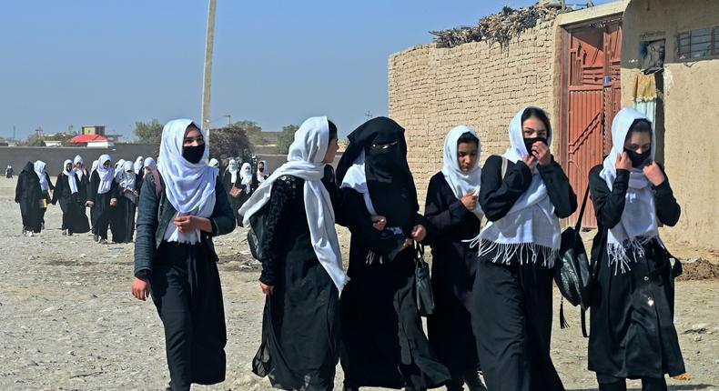 Afghan schoolgirls returning from school in Mazar-i-Sharif on Oct. 30, 2021.