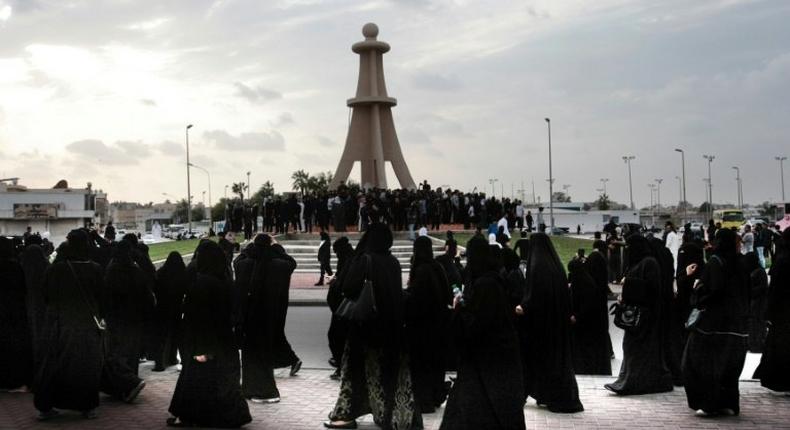 Saudi Shiites take part in a protest on January 2, 2016 in Qatif against the execution of a prominent Shiite Muslim cleric by Saudi authorities for his involvement in protests that broke out in 2011