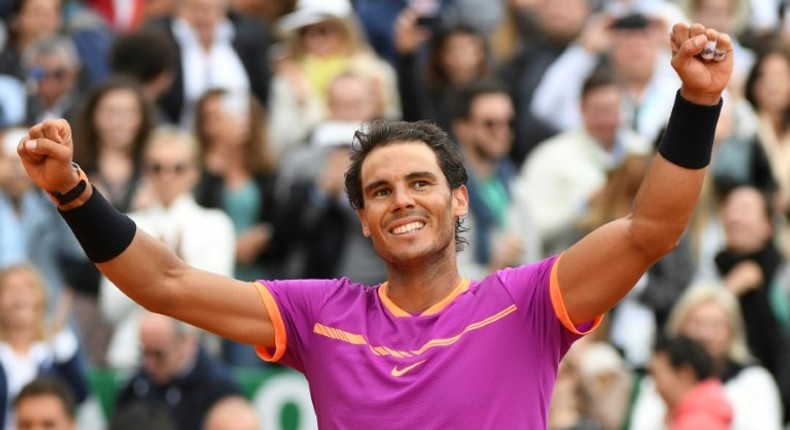 Spain's Rafael Nadal celebrates after beating compatriot Albert Ramos-Vinolas to clinch his 10th Monte Carlo Masters title in Monaco, on April 23, 2017