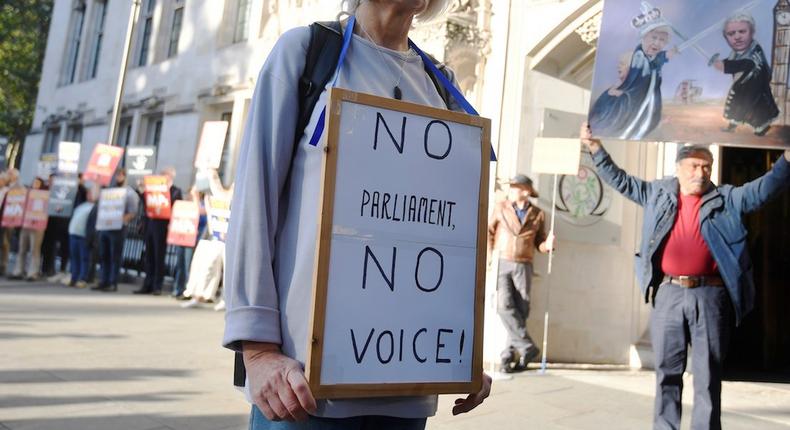 People protest outside the Supreme Court of the United Kingdom against Prime Minister Boris Johnson's decision to prorogue parliament, in London, Britain September 17, 2019.