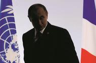 Russian President Putin leaves after delivering a speech for the opening day of the World Climate Ch
