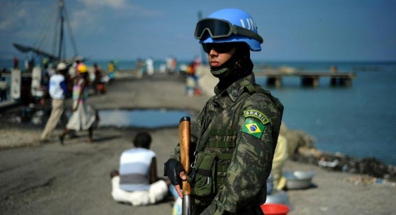 A Brazilian member of the UN peackeeping mission in Haiti patrols the Cite Soleil slum of the capital Port-au-Prince in this file photo