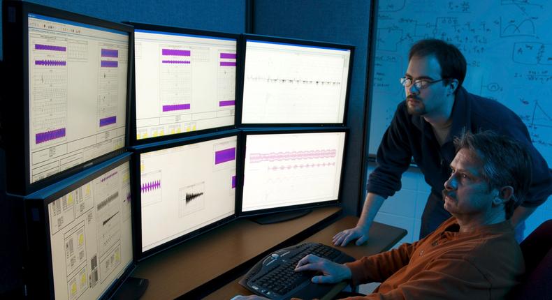 Department of Homeland Security (DHS) researchers use advanced modeling and simulation equipment as they work on the DHS Control Systems Security Program (CSSP).