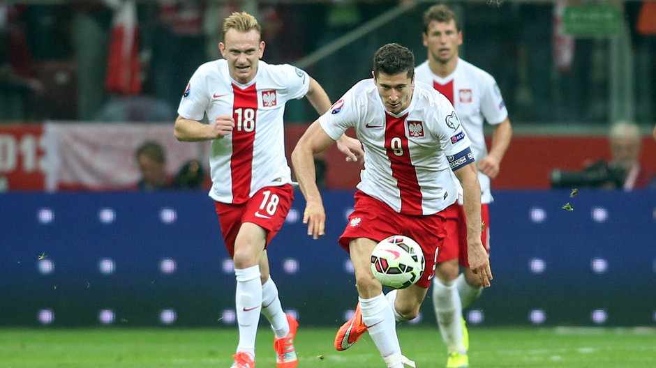 Sebastian Mila i Robert Lewandowski w meczu Polska - Niemcy (2014 r.)