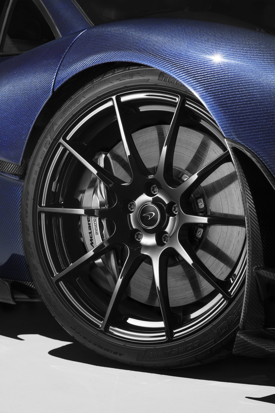 The gloss-black wheels are also a custom feature. About the only thing that would stop you faster than those carbon-ceramic brakes would be a brick wall.