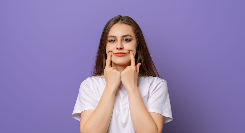 Toxic positivity in the workplace can be seen in behaviors such as 'glossing' (stock image.)Anastasiia Makarevich/Getty Images