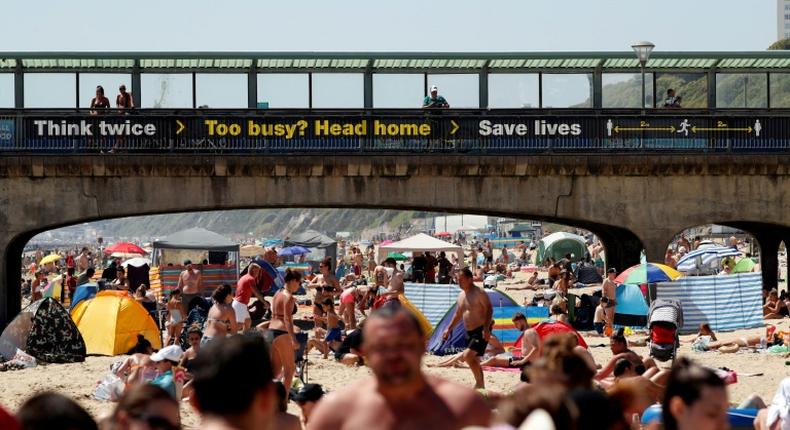 Britons revelled in soaring temperatures by flocking to beaches and parks ahead of a further easing of lockdown measures