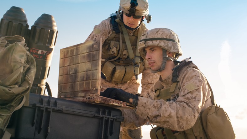 Soldiers,Are,Using,Laptop,Computer,For,Surveillance,During,Military,Operation