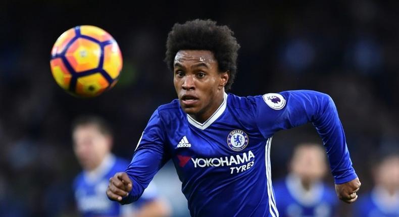 Chelsea's midfielder Willian chases the ball during the English Premier League football match between Chelsea and Bournemouth at Stamford Bridge in London on December 26, 2016