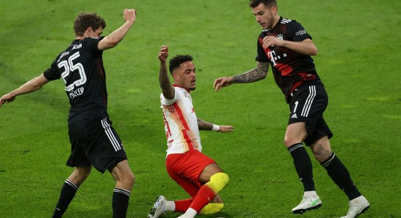 Bayern Munich team-mates Thomas Mueller (L) and Lucas Hernandez (R) will be on opposing sides when France play Germany at Euro 2020 on Tuesday Creator: ALEXANDER HASSENSTEIN