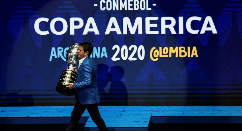 Former Brazil footballer Juninho Paulista presented the Copa America trophy at the draw ceremony in December 2019 Creator: Juan BARRETO