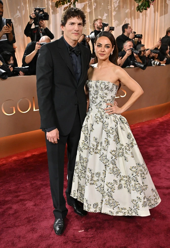 Eštin Kučer i Mila Kunis