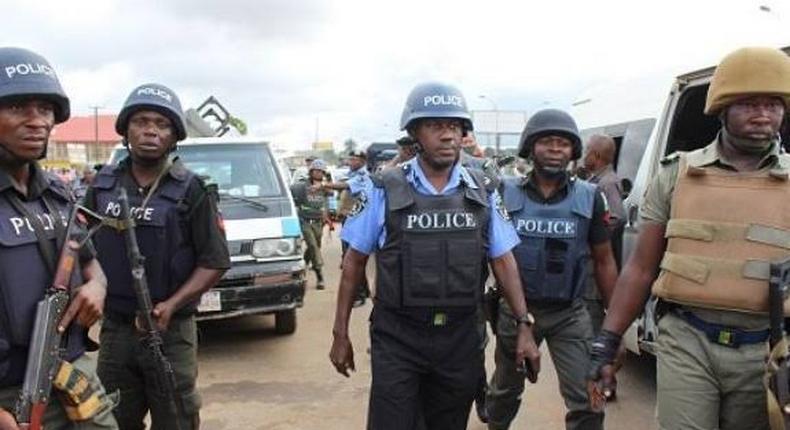 Some policemen attached to Onikan division in Lagos, had engaged some suspected armed robbers in gunfire, which led to the death of a policewoman. (The image of the policemen is used for illustrative purpose) [Vanguard]