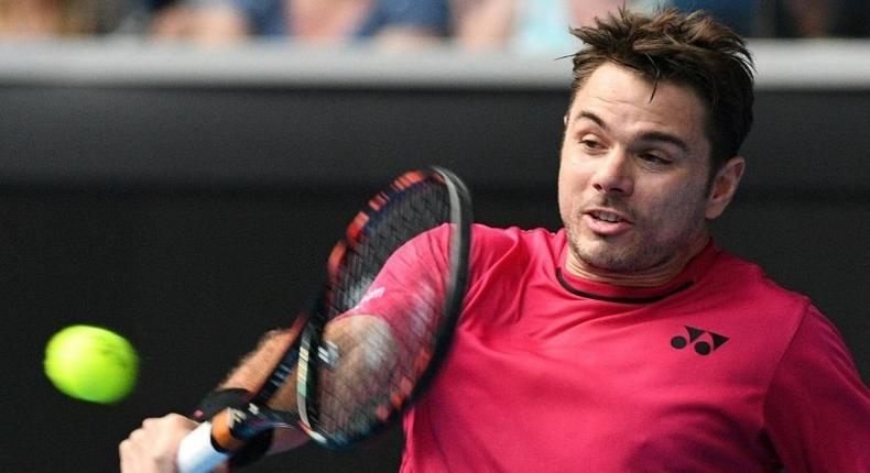 Switzerland's Stan Wawrinka in action against Martin Klizan of Slovakia in the first round of the Australian Open in Melbourne on January 16, 2017