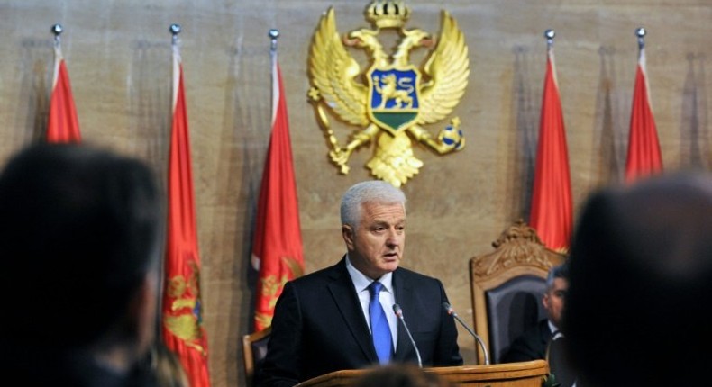 The newly elected Montenegrin Prime Minister Dusko Markovic (C) delivers a speech during a ceremony at the Montenegro Parliament in Podgorica on November 28, 2016