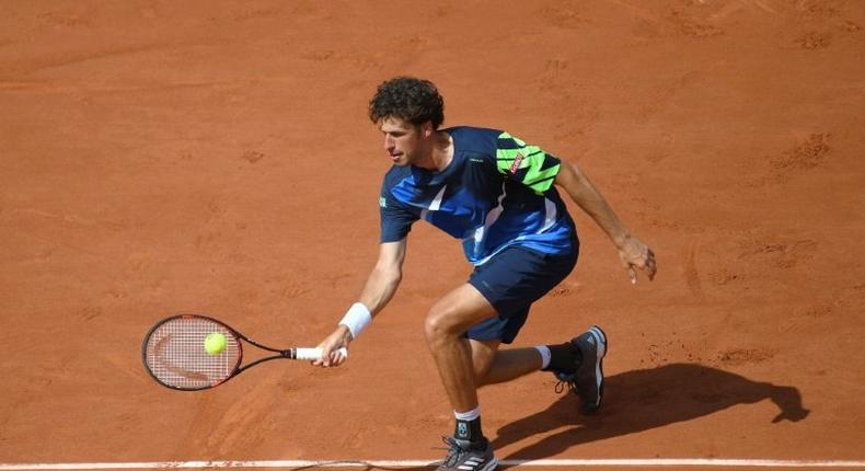 Netherlands' Robin Haase returns the ball to Spain's Rafael Nadal during their tennis match at the Roland Garros 2017 French Open on May 31, 2017 in Paris.