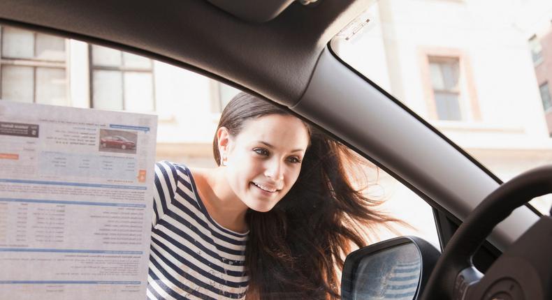 woman buying a car