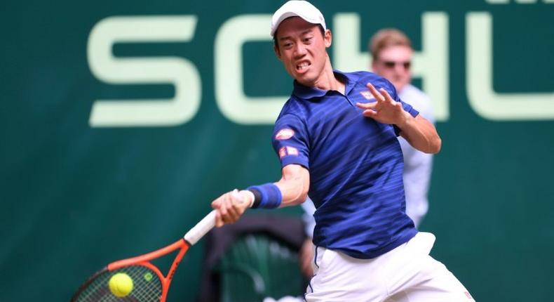 Kei Nishikori from Japan plays against Karen Khachanov from Russia during the ATP tournament tennis match in Halle, western Germany, on June 22, 2017