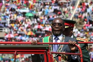Zimbabwe's President Mugabe arrives to address Zimbabwe's Independence Day celebrations in Harare