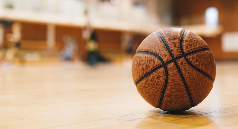 A stock photo of a basketball on a court.matimix / Getty Images