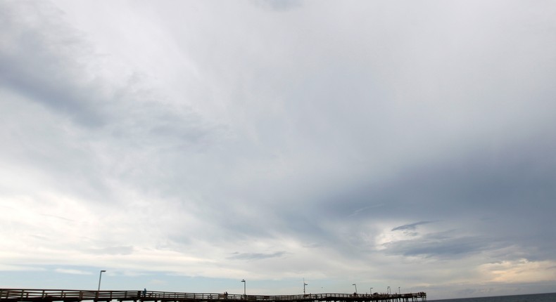 In this Aug. 24, 2011 photo, people play at the beach at Cape Hatteras National Seashore in Avon, N.C.AP Photo/Jose Luis Magana, File