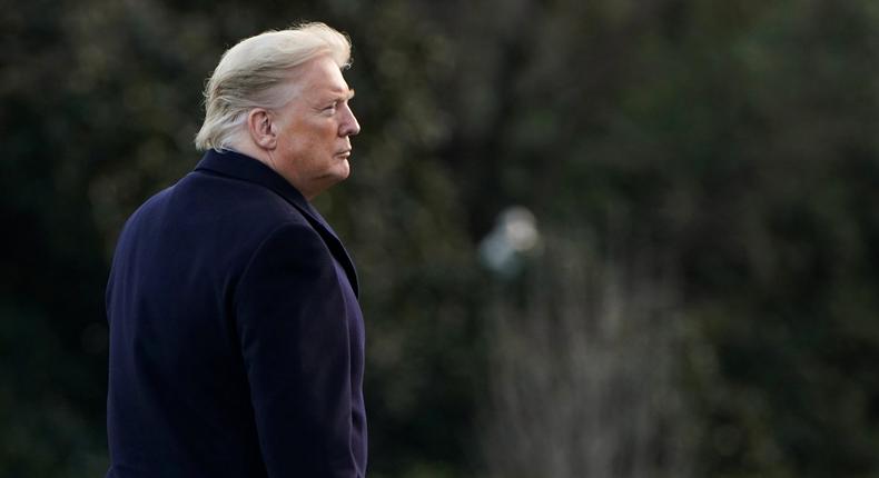 FILE PHOTO: U.S. President Donald Trump walks to the Oval Office as he returns from a day trip from North Carolina at the White House in Washington, U.S., February 7, 2020.    REUTERS/Joshua Roberts