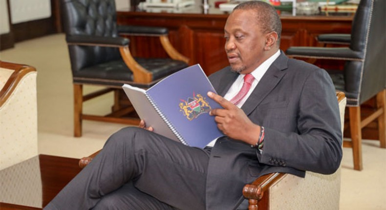 President Uhuru Kenyatta reading BBI report