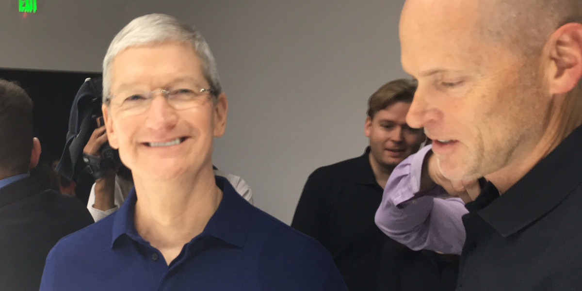 Apple CEO TIm Cook getting ready to show the iPhone 7 to the press.