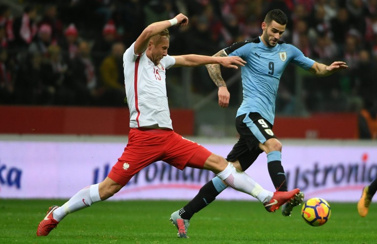 Kamil Glik (L) i Gastón Pereiro (P)