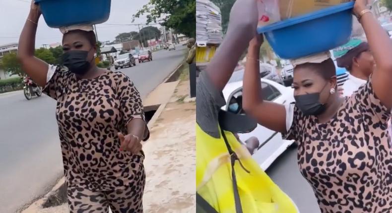 Sista Afia takes over street hawker's job in traffic; gives out free water, drinks 